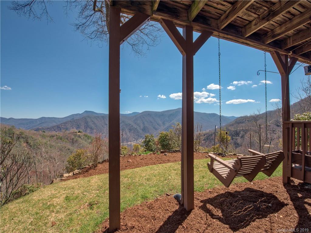 464 Bent Tree Road Maggie Valley, NC 28751 - Photo 32 of 38 a view of a couches in patio of a house