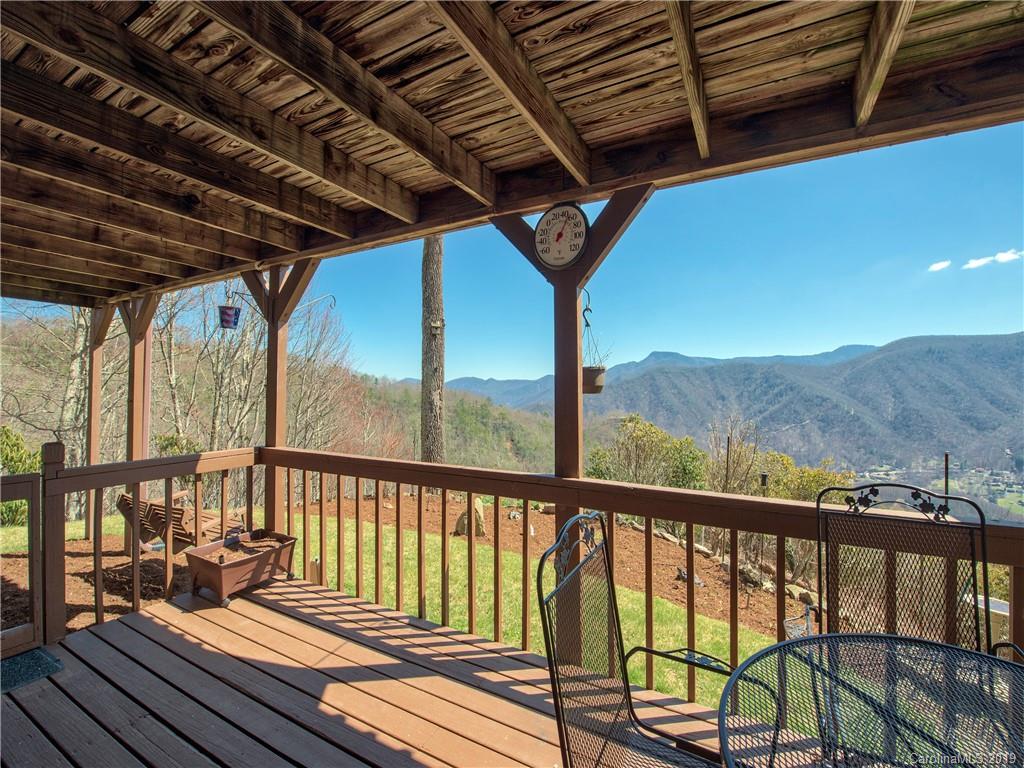 464 Bent Tree Road Maggie Valley, NC 28751 - Photo 35 of 38 a view of a balcony with furniture