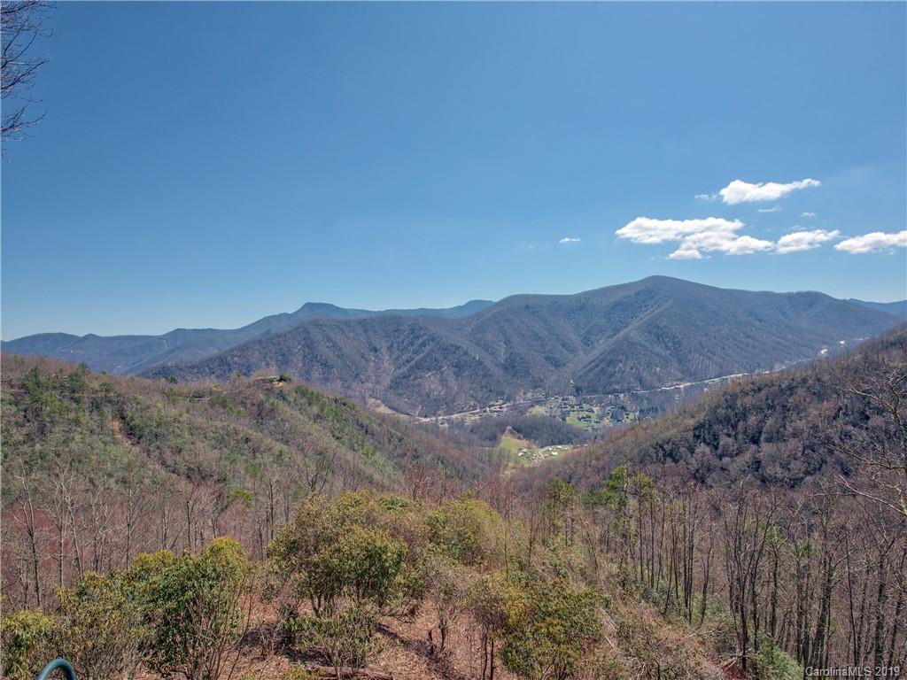 464 Bent Tree Road Maggie Valley, NC 28751 - Photo 36 of 38 a view of a dry yard with mountains in the background