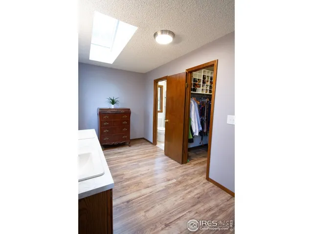 a hallway with a large window and a hallway