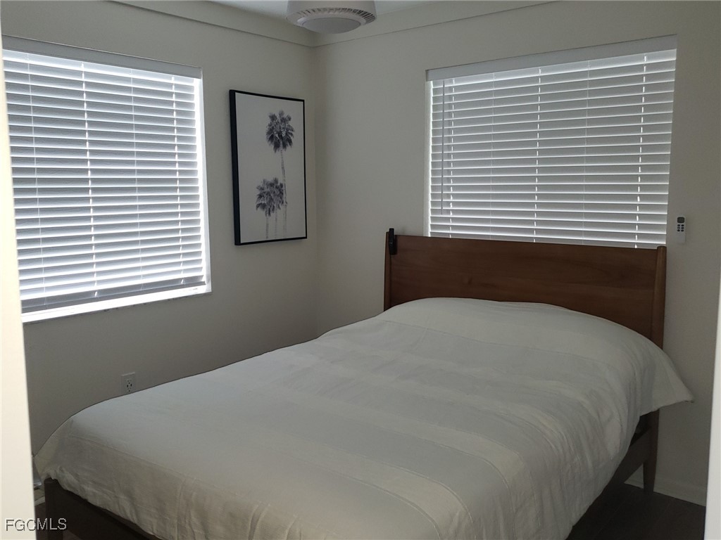 2111 Waylife Court Alva, FL 33920 - Photo 10 of 17 a bedroom with a bed and a window