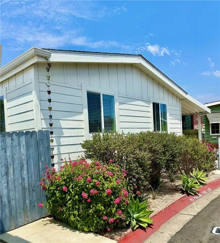 a bathroom with a shower and a mirror