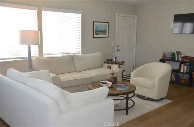 a kitchen with stainless steel appliances granite countertop a sink stove and microwave