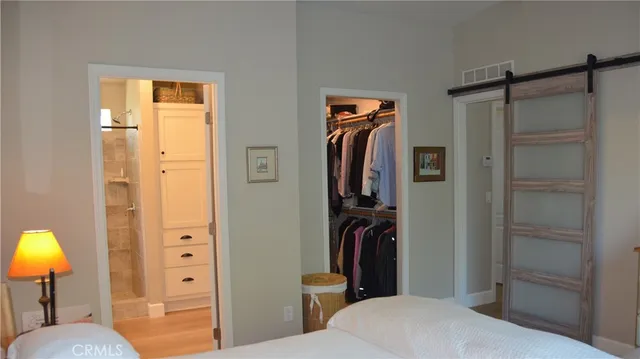 a view of a bathroom from a hallway