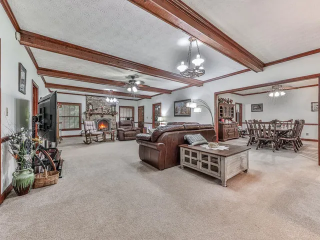 a bedroom with furniture and a chandelier