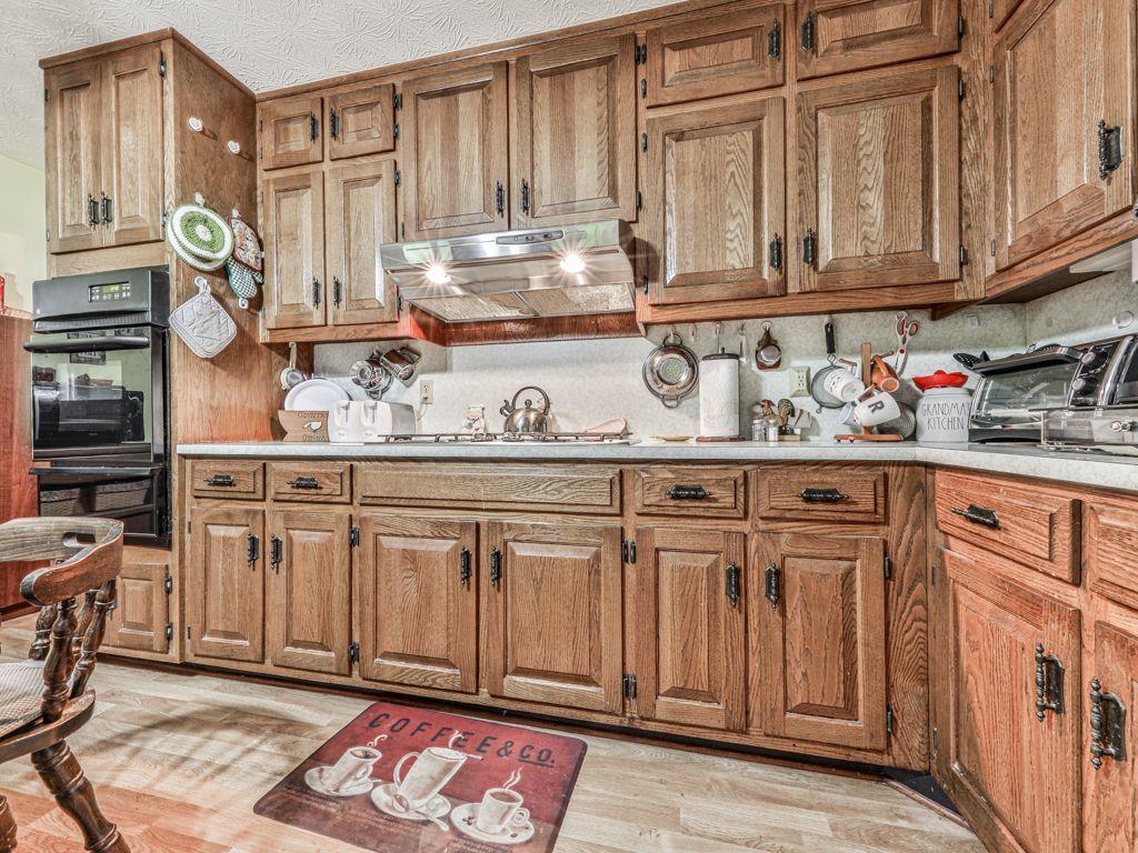 2760 Hembree Road Northeast Marietta, GA 30062 - Photo 15 of 65 a kitchen with stainless steel appliances granite countertop a sink and cabinets