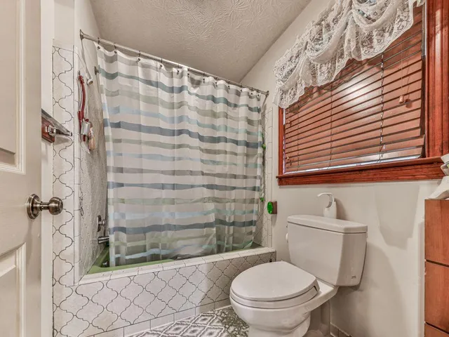 a workspace with furniture and a window