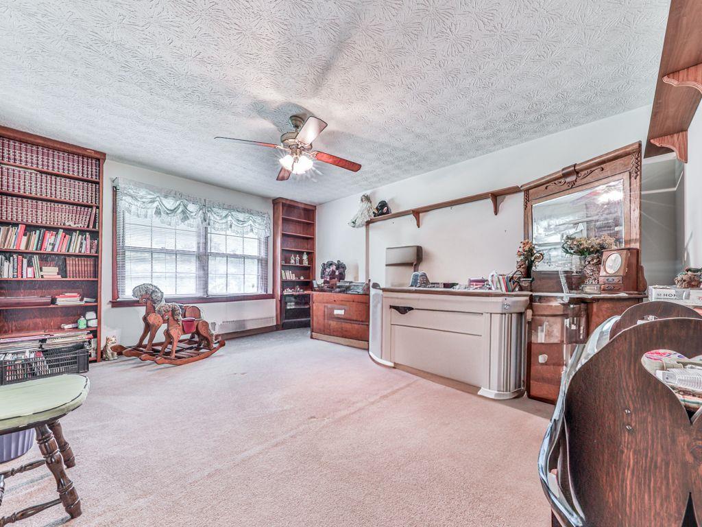2760 Hembree Road Northeast Marietta, GA 30062 - Photo 25 of 65 a living room with furniture and a large window
