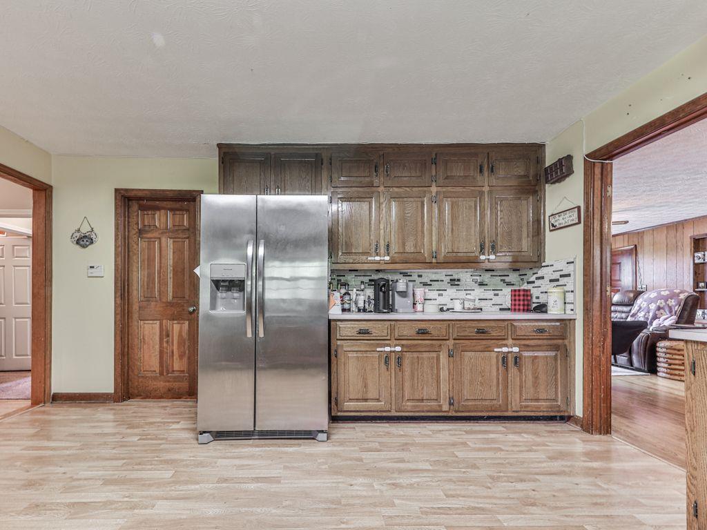 2760 Hembree Road Northeast Marietta, GA 30062 - Photo 40 of 65 a kitchen with stainless steel appliances granite countertop a refrigerator and a stove