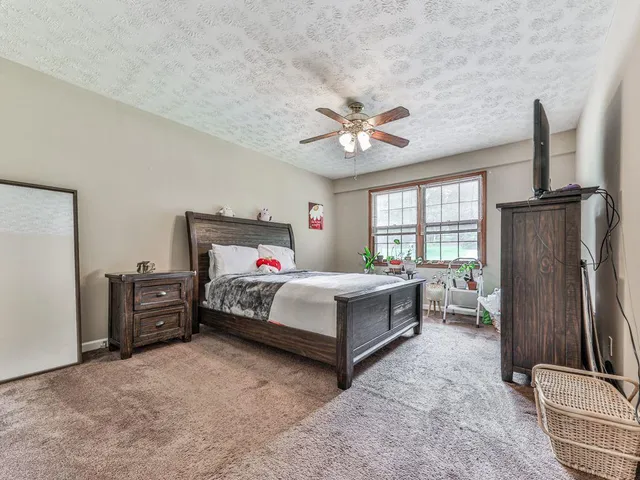 a bathroom with a sink vanity and a mirror