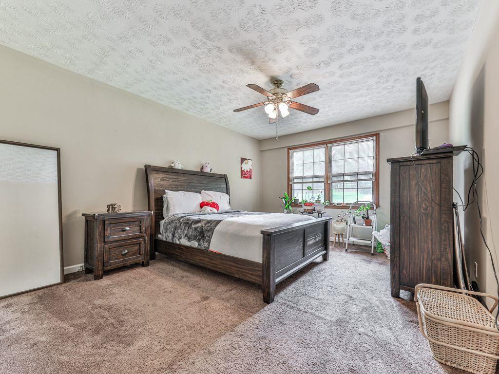 2760 Hembree Road Northeast Marietta, GA 30062 - Photo 41 of 65 a bedroom with a bed and a window