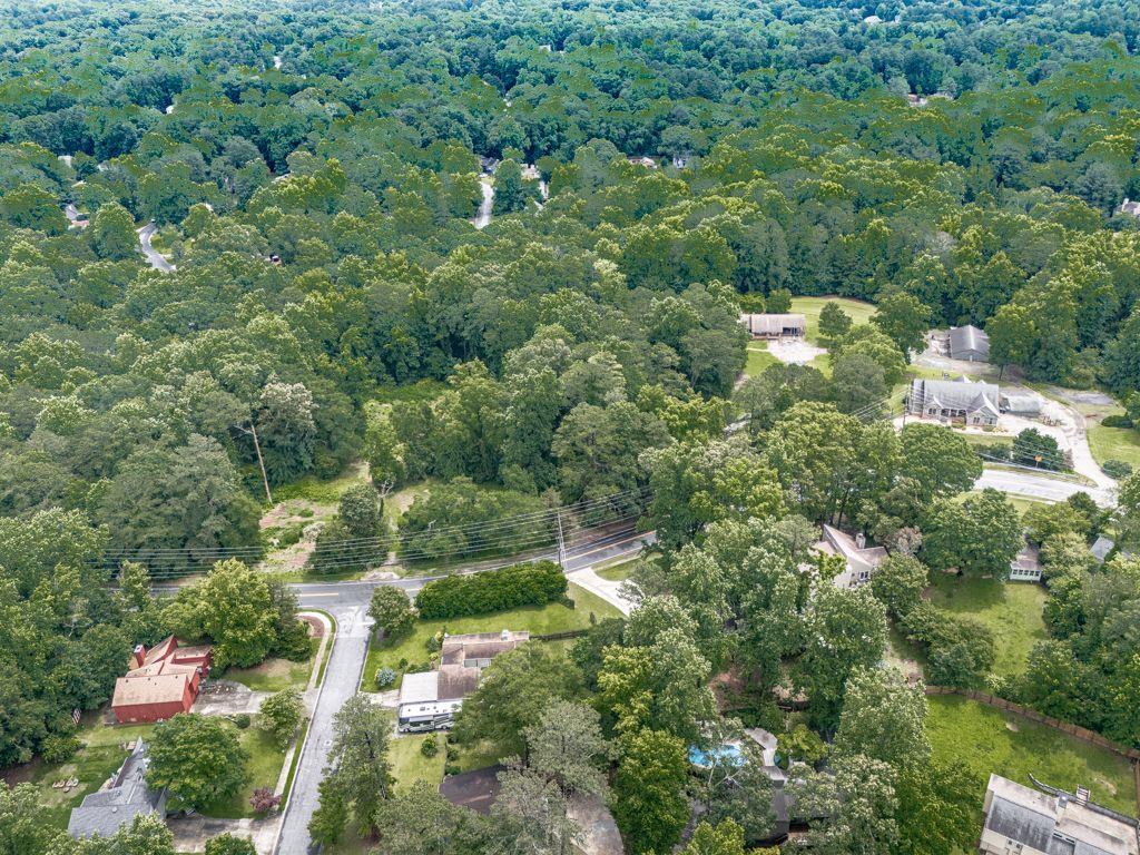 2760 Hembree Road Northeast Marietta, GA 30062 - Photo 50 of 65 an aerial view of residential house with outdoor space and trees all around