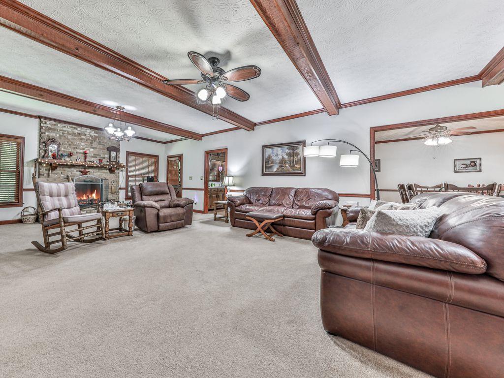 2760 Hembree Road Northeast Marietta, GA 30062 - Photo 10 of 65 a living room with furniture and a large window