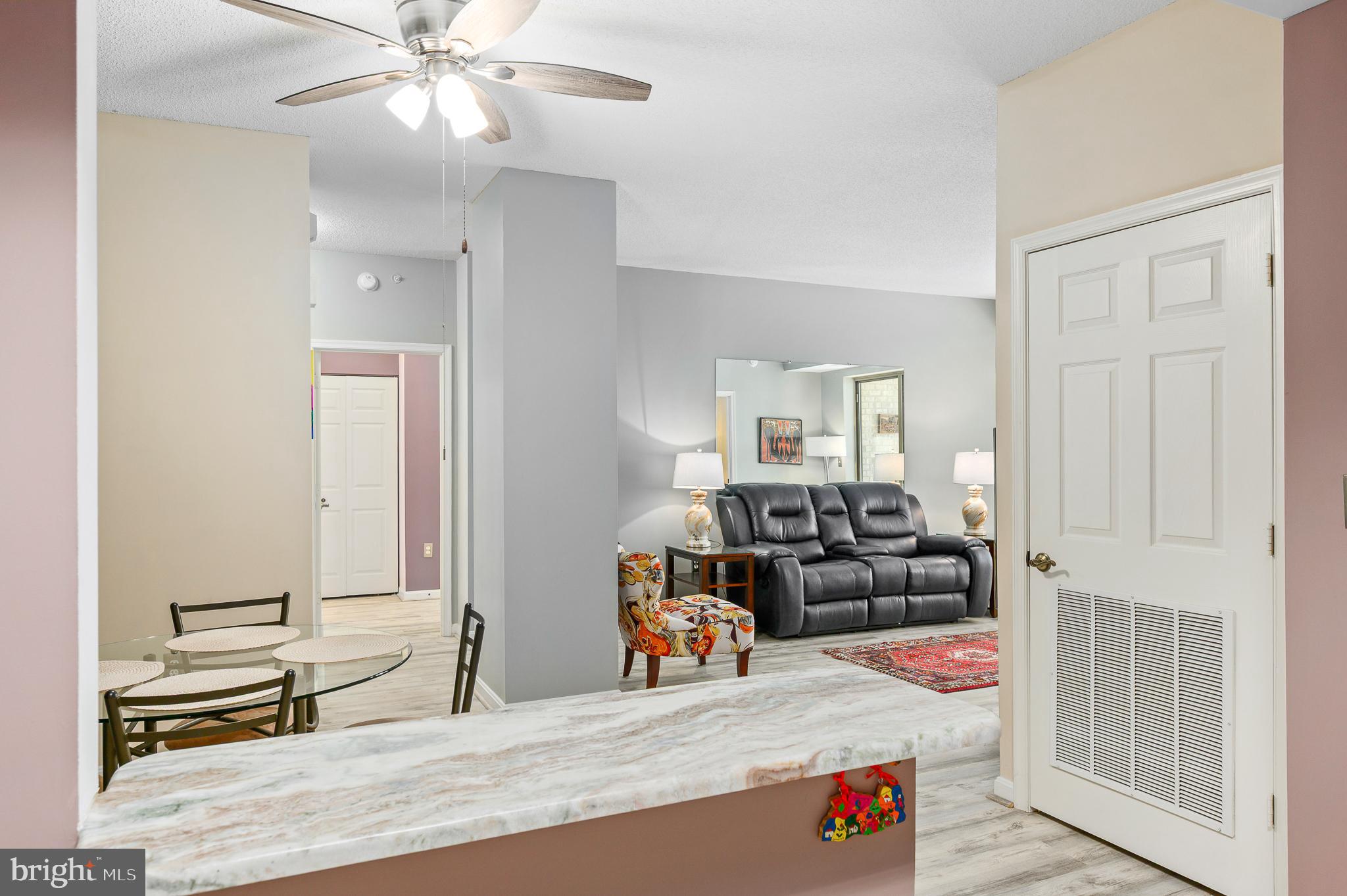 19355 Cypress Ridge Terrace, Unit 422 Leesburg, VA 20176 - Photo 14 of 34 View of dining/living