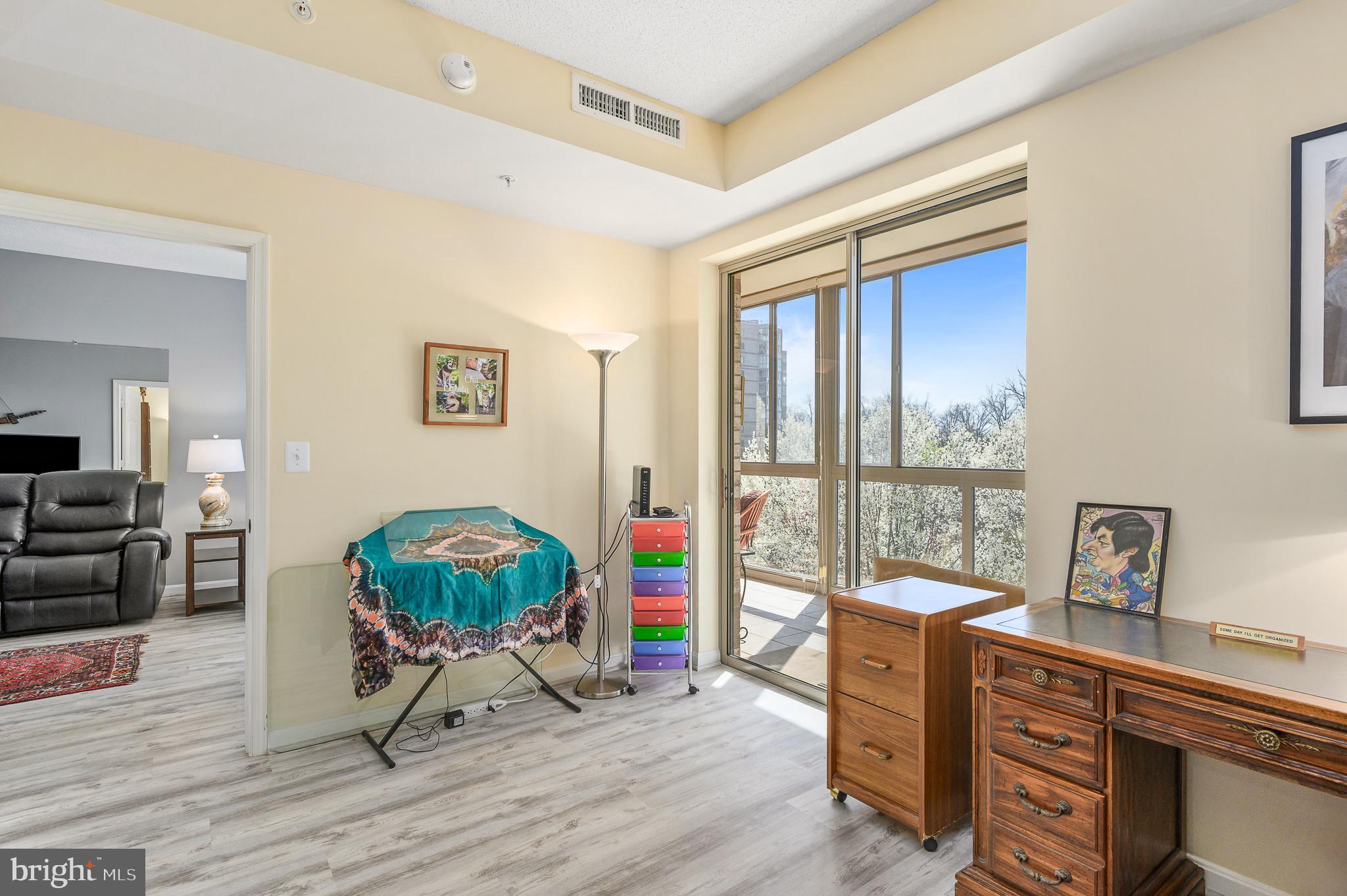 19355 Cypress Ridge Terrace, Unit 422 Leesburg, VA 20176 - Photo 16 of 34 2nd bedroom opens to sunroom