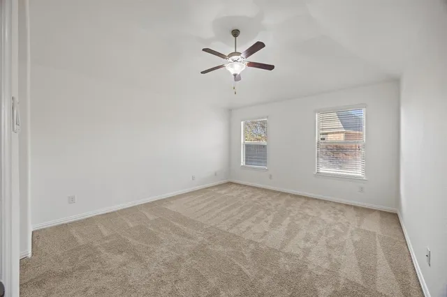 a view of a big room with carpet