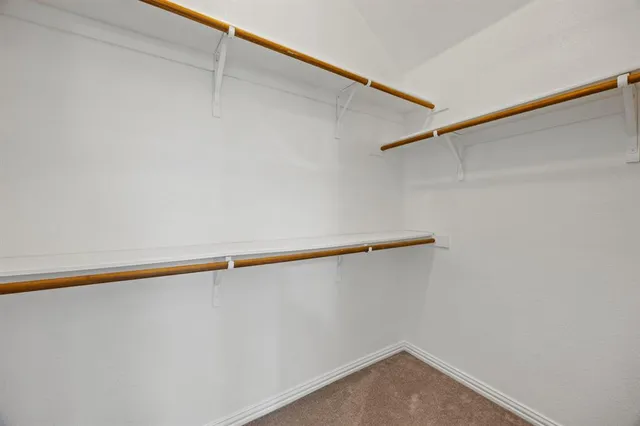 a view of small space with racks on the wall