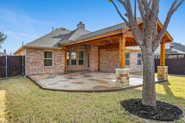a front view of a house with entertaining space