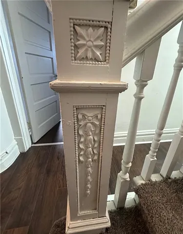 a front view of a house with a wooden door