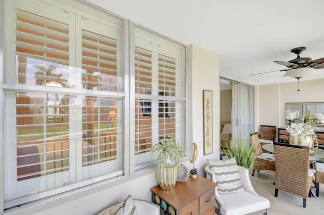 a living room with furniture and windows