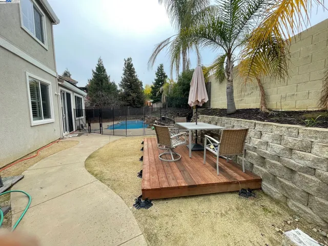 a house view with a garden space