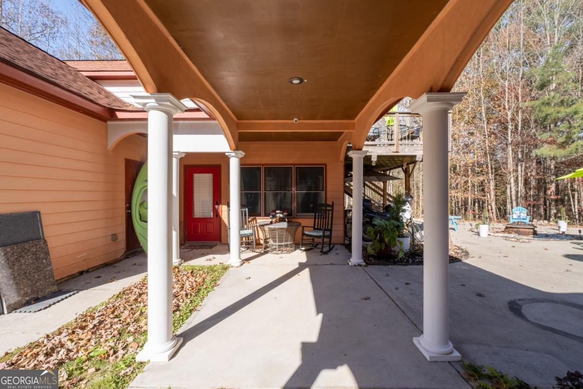 1045 Fincher Road Canton, GA 30114 - Photo 33 of 69 a view of a porch with chairs