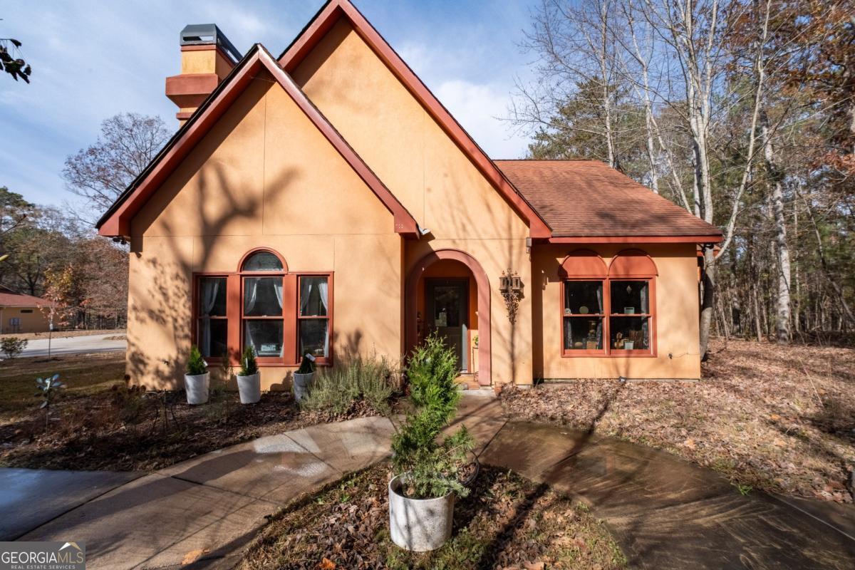 1045 Fincher Road Canton, GA 30114 - Photo 5 of 69 a view of a house with a yard and pathway