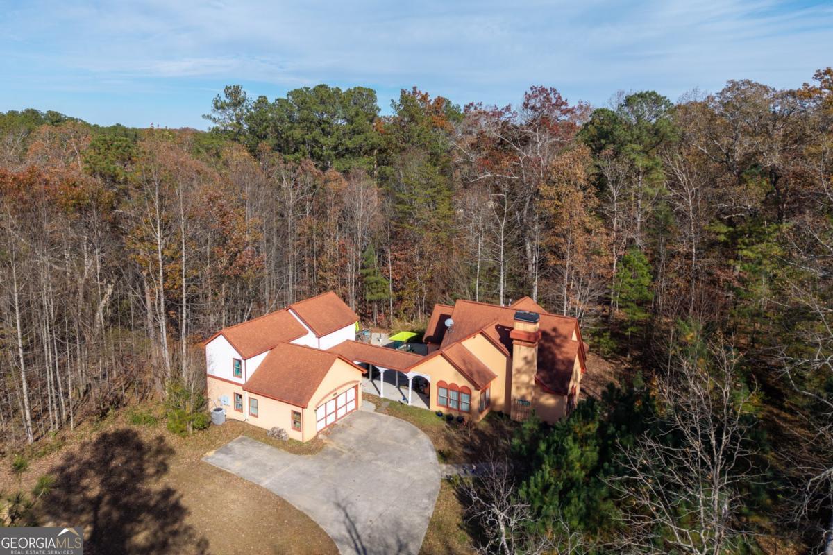1045 Fincher Road Canton, GA 30114 - Photo 60 of 69 a view of a sitting area with trees in the background