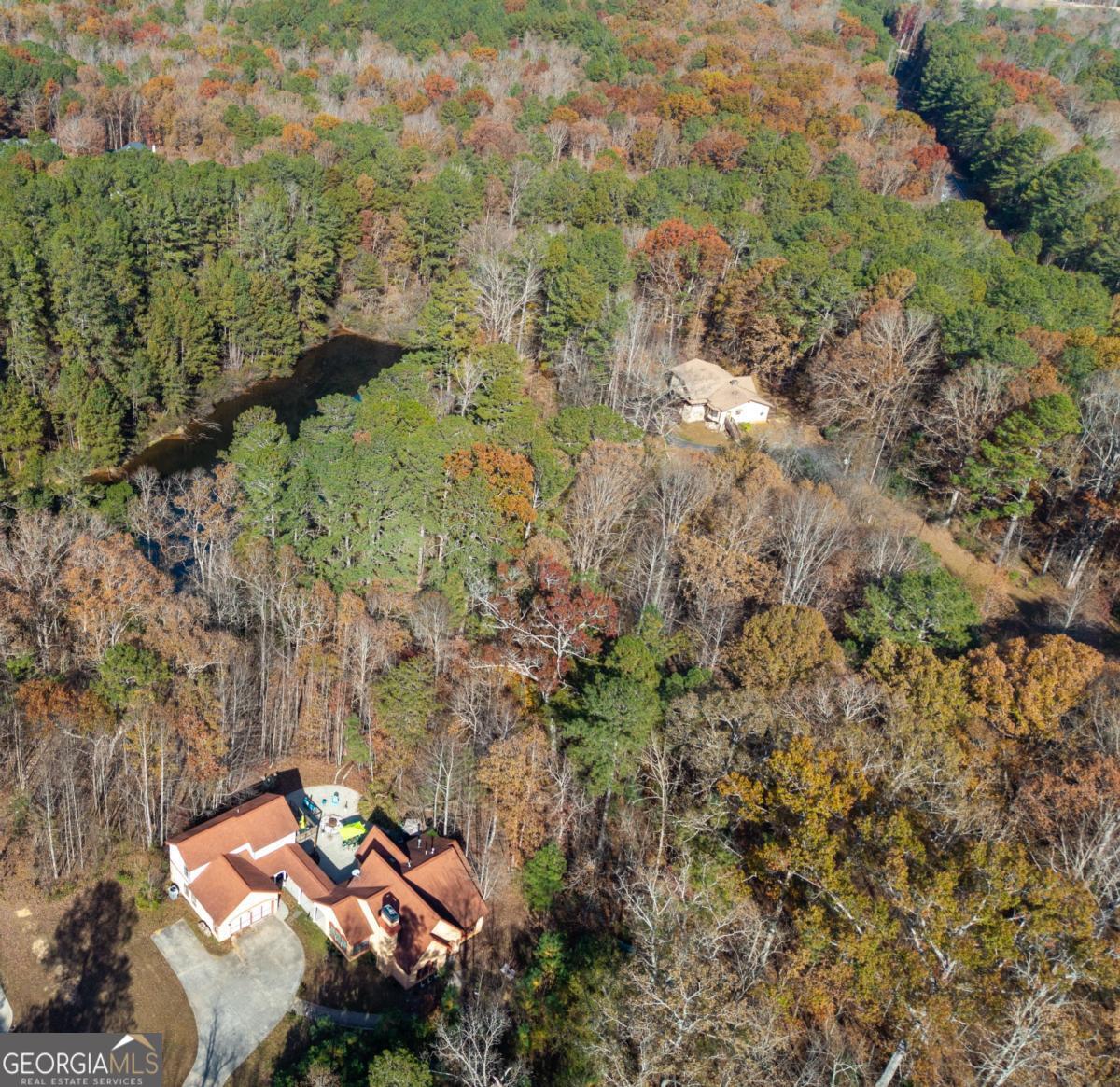 1045 Fincher Road Canton, GA 30114 - Photo 63 of 69 an aerial view of a house with a yard
