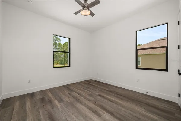 a view of room with hardwood floor
