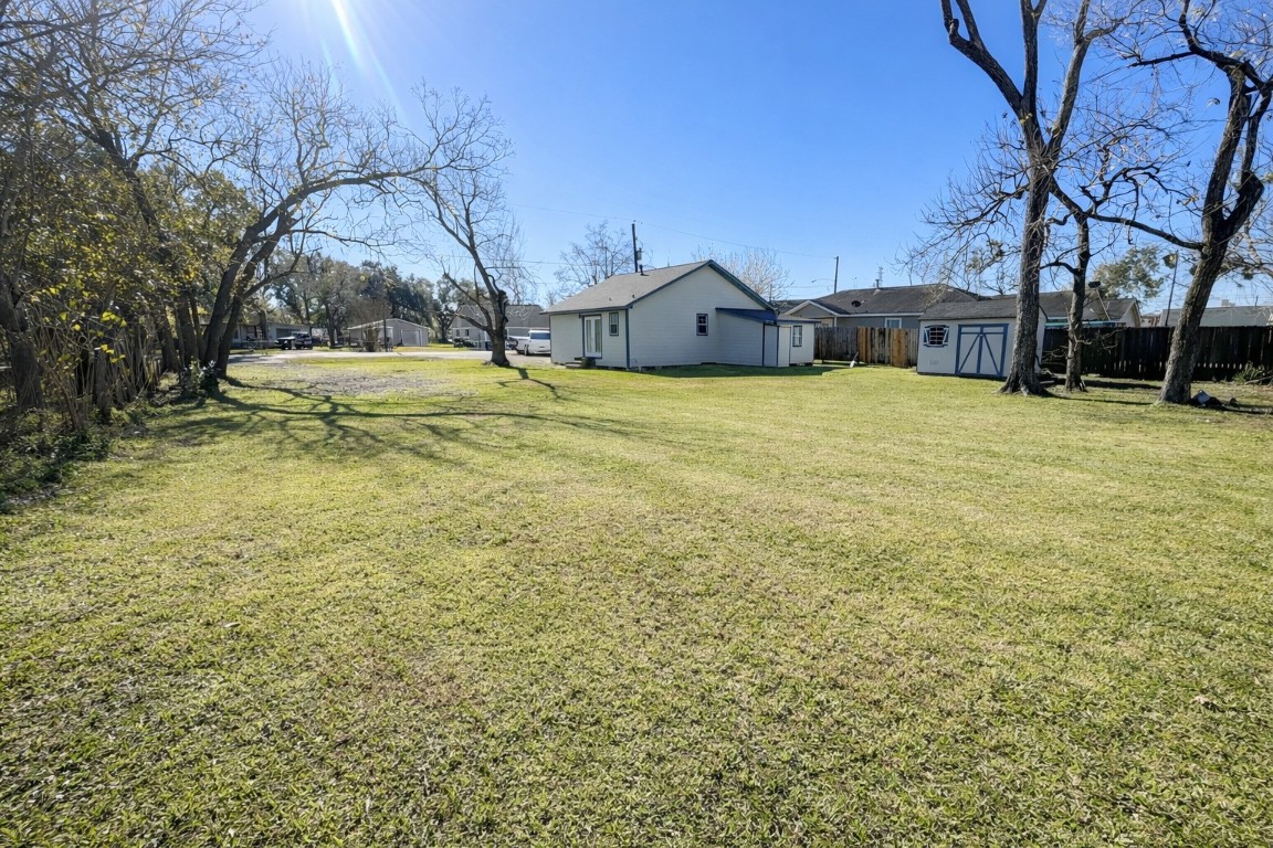 612 Harvey Street Clute, TX 77531 - Photo 12 of 12 a view of a house with a yard