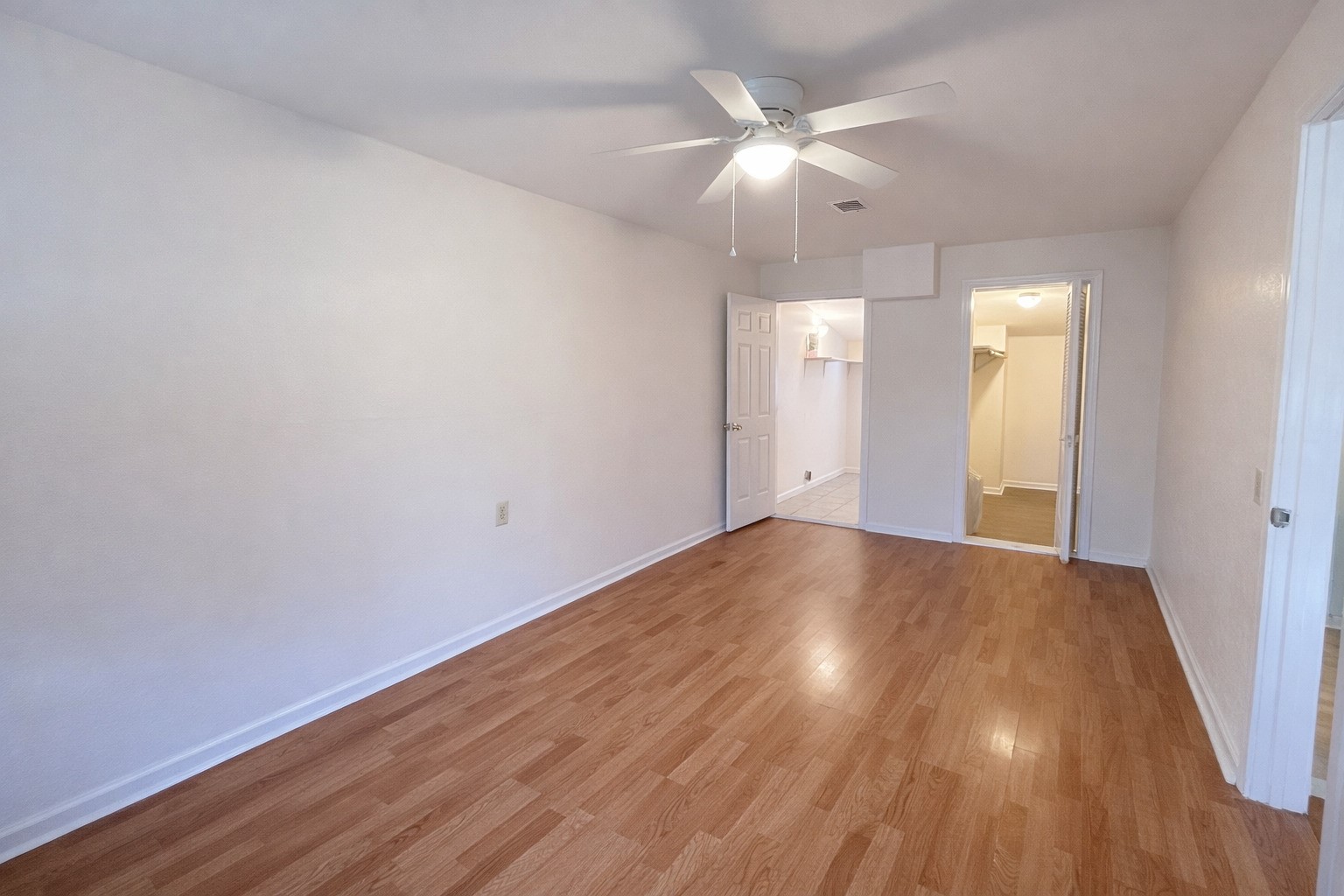 612 Harvey Street Clute, TX 77531 - Photo 6 of 12 a view of an empty room with wooden floor