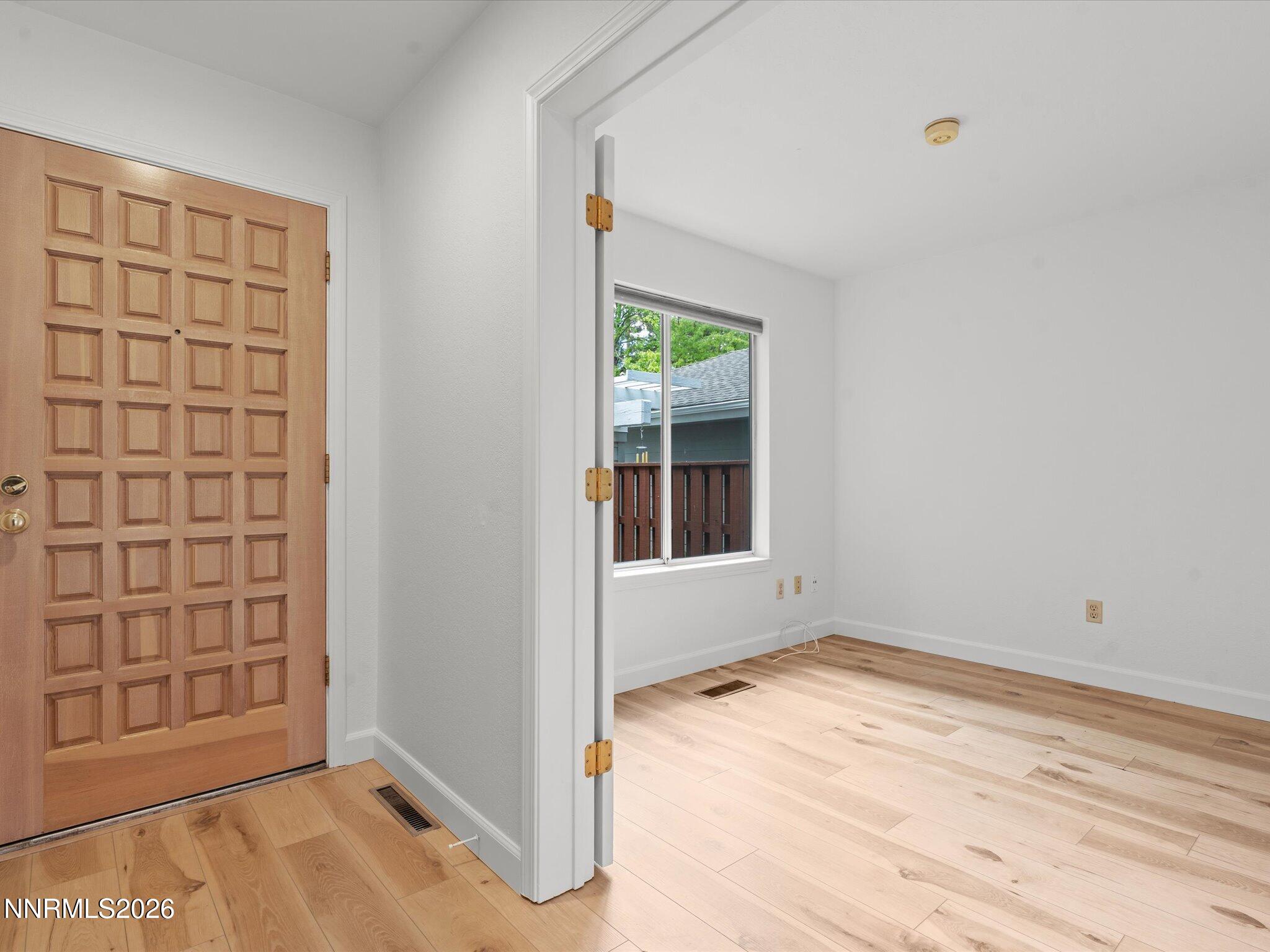 3170 Oakshire Court Reno, NV 89509 - Photo 4 of 43 an empty room with windows