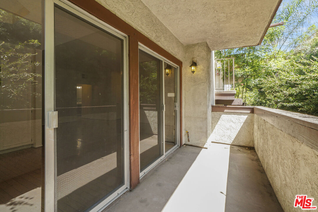 5534 Sylmar Avenue, Unit 5 Sherman Oaks, CA 91401 - Photo 14 of 33 a view of balcony with couch