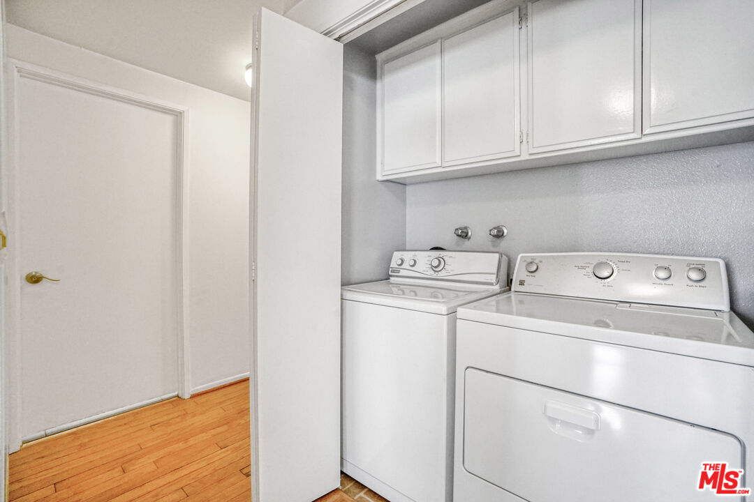 5534 Sylmar Avenue, Unit 5 Sherman Oaks, CA 91401 - Photo 16 of 33 a utility room with dryer and washer