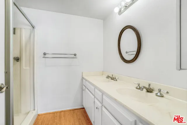 a bathroom that has a shower toilet and sink