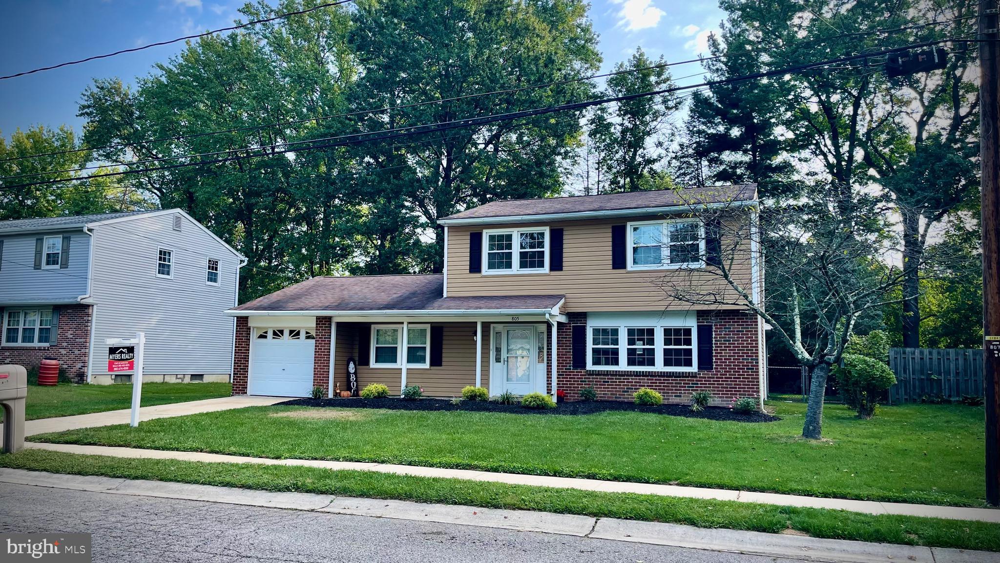 805 Devon Drive Newark, DE 19711 - Photo 2 of 35 a view of a yard in front of a house