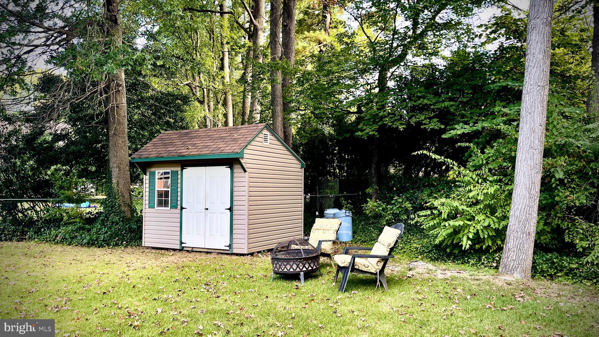 805 Devon Drive Newark, DE 19711 - Photo 21 of 35 a view of backyard with seating space and trees