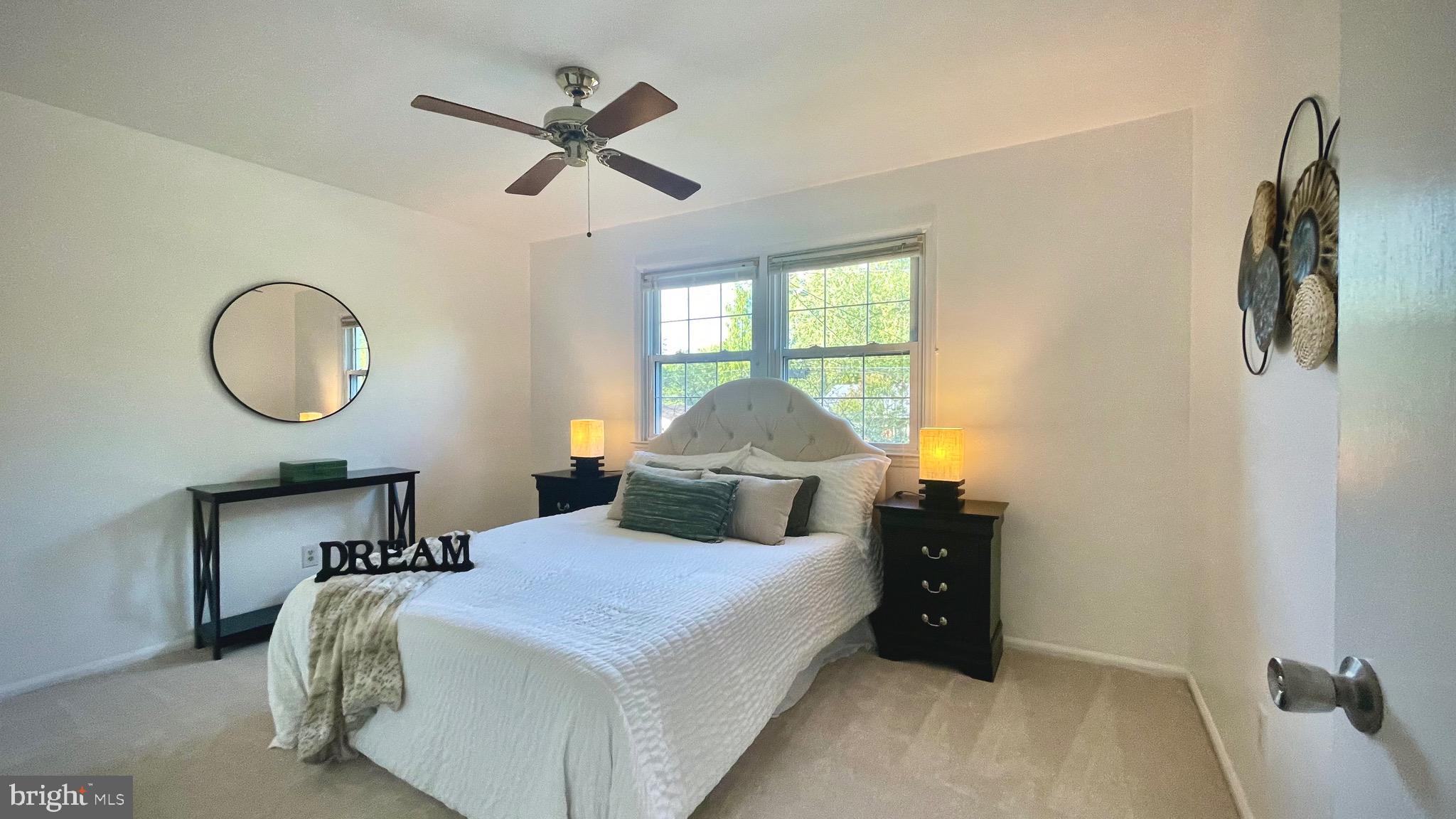 805 Devon Drive Newark, DE 19711 - Photo 29 of 35 a bedroom with a bed and window
