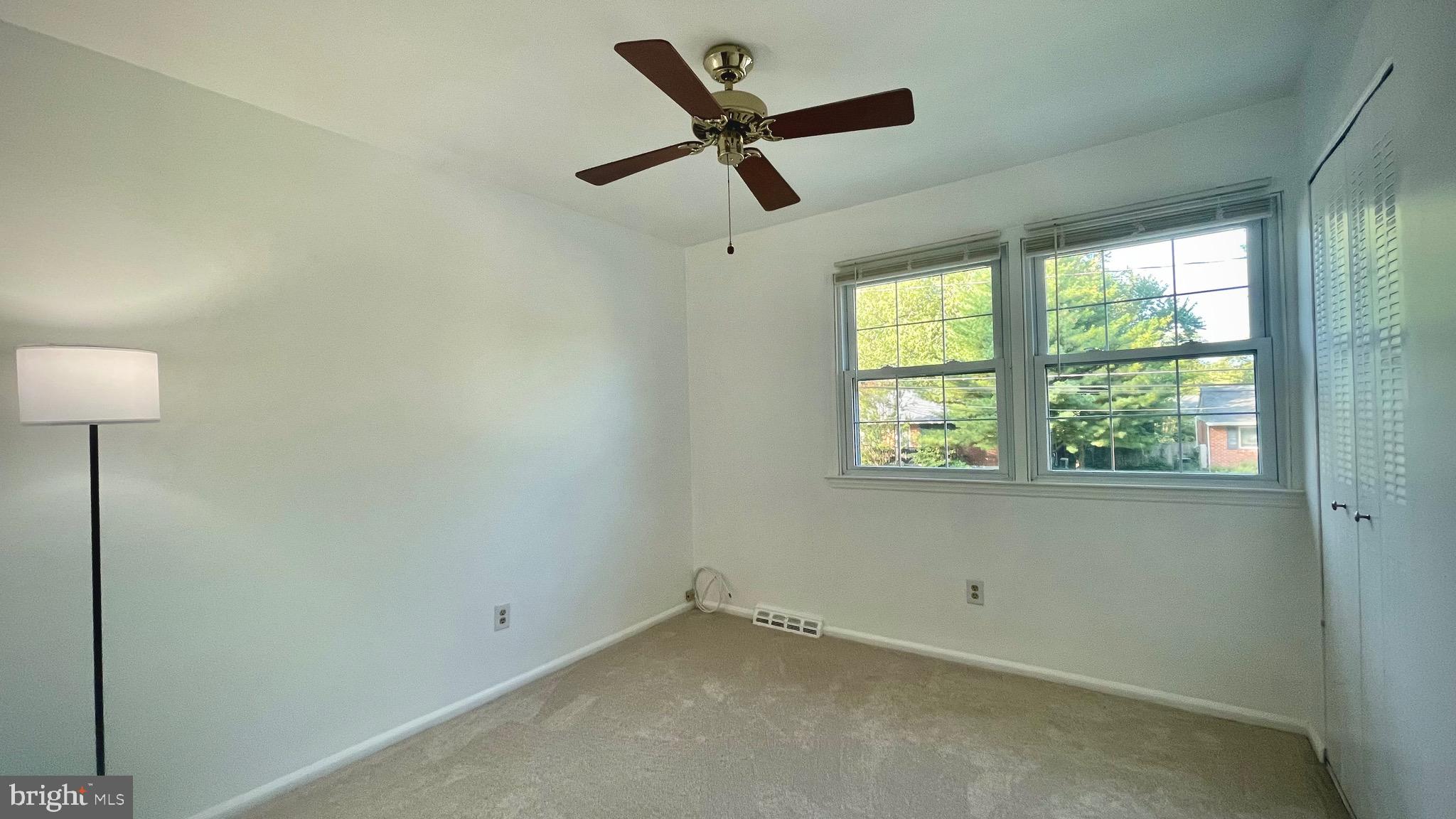 805 Devon Drive Newark, DE 19711 - Photo 31 of 35 a room with a window and a ceiling fan