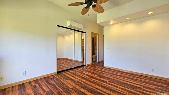 a view of a balcony with wooden floor