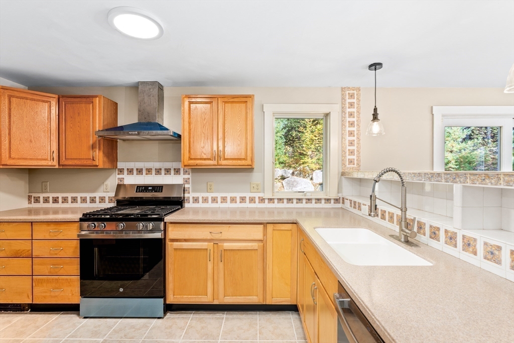 230 South Ashfield Road Conway, MA 01096 - Photo 15 of 35 a kitchen with a stove a sink and a granite counter tops