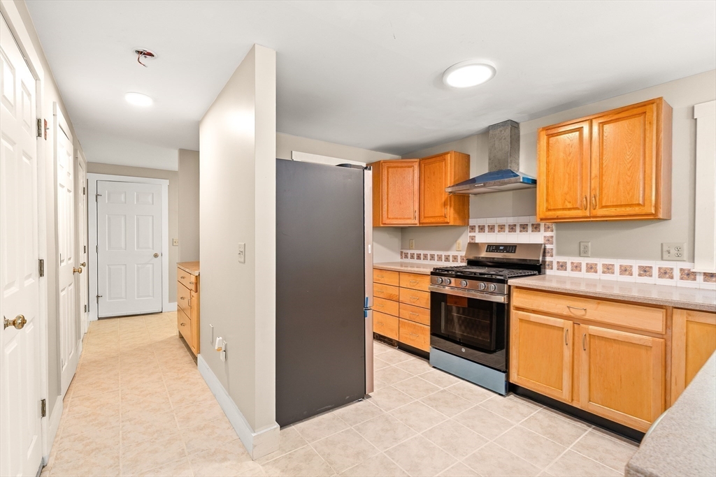 230 South Ashfield Road Conway, MA 01096 - Photo 17 of 35 a kitchen with stainless steel appliances granite countertop a stove and a refrigerator