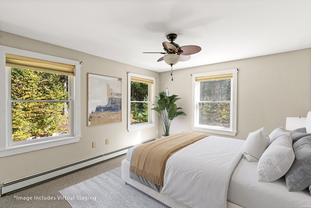 230 South Ashfield Road Conway, MA 01096 - Photo 24 of 35 a bedroom with a large bed and a window