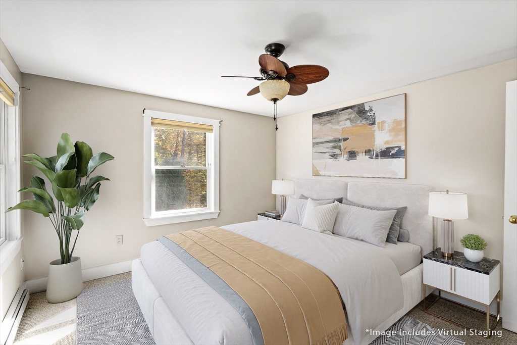 230 South Ashfield Road Conway, MA 01096 - Photo 25 of 35 a bedroom with a large bed and a window