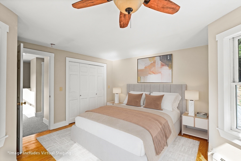 230 South Ashfield Road Conway, MA 01096 - Photo 27 of 35 a bedroom with a bed and painting on the wall