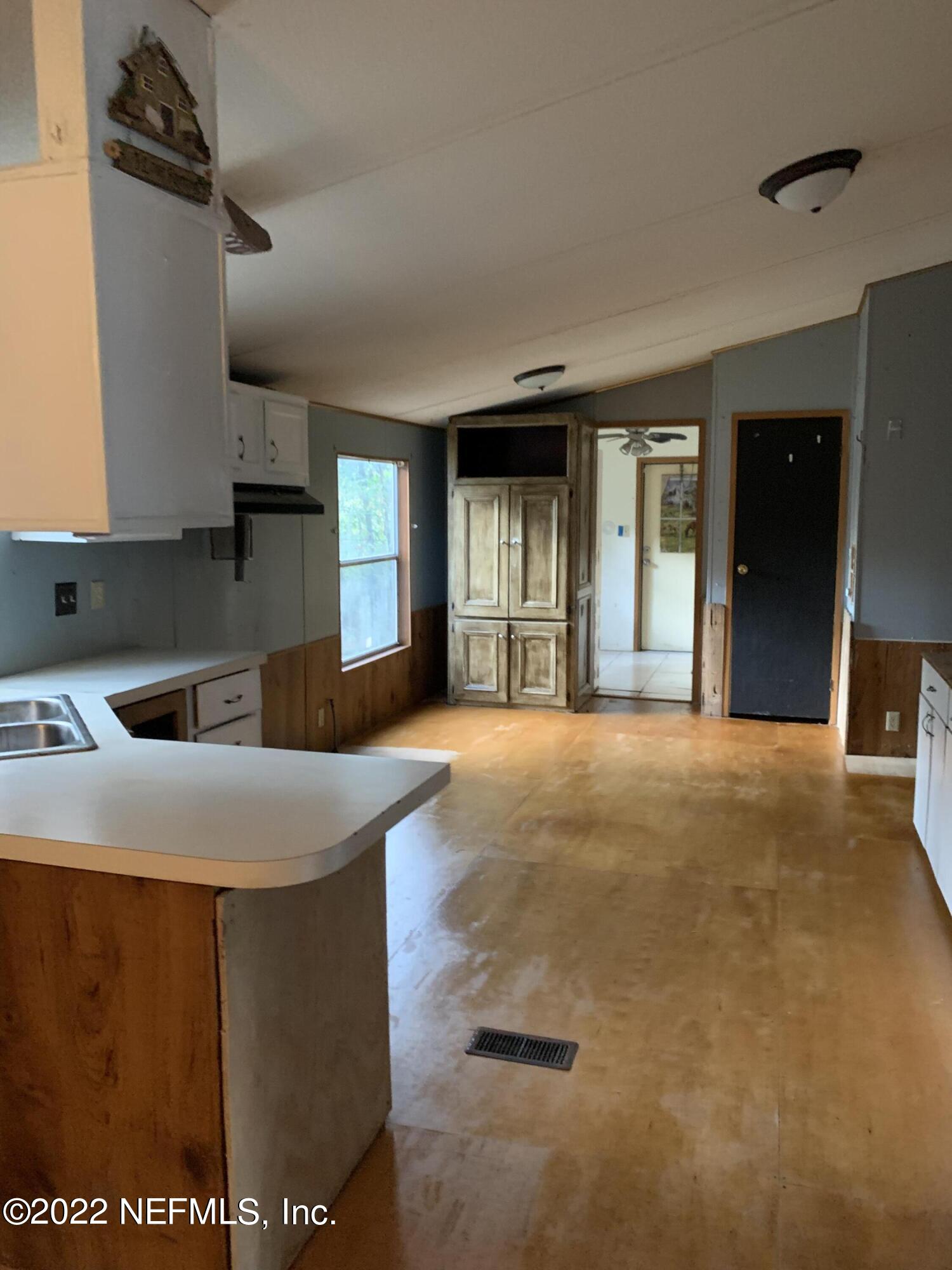 3163 Lannie Road Jacksonville, FL 32218 - Photo 19 of 36 a view of a kitchen with a sink