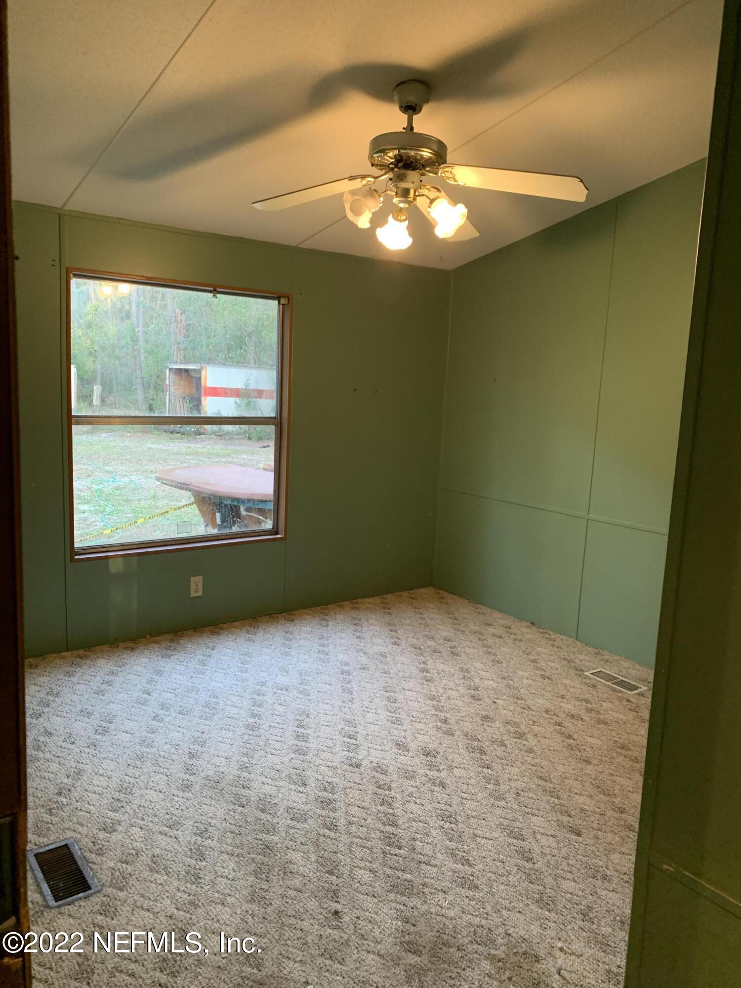 3163 Lannie Road Jacksonville, FL 32218 - Photo 28 of 36 a view of empty room with window