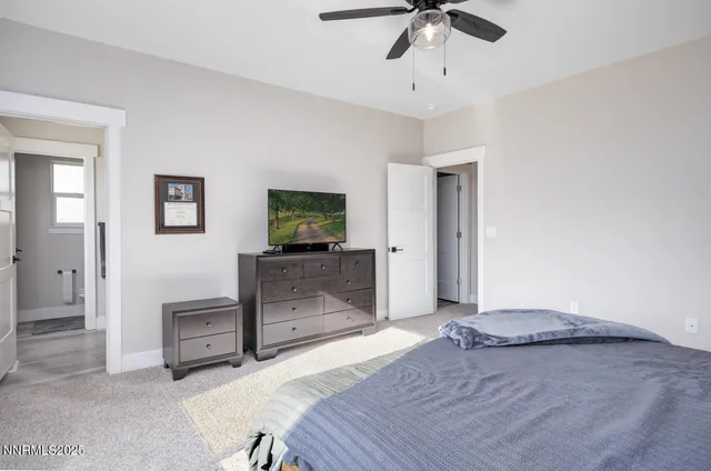 a bedroom with furniture and a bed