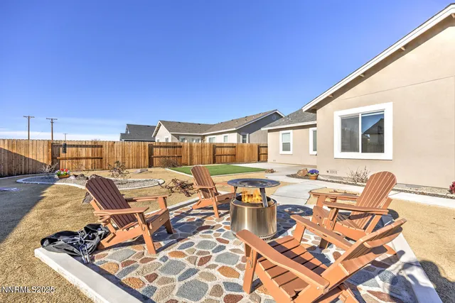 a picture of a table and chairs on the roof deck